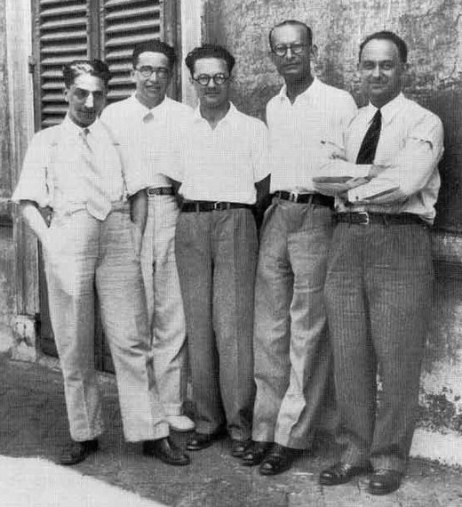 Fermi and his research group (the Via Panisperna boys) in the courtyard of Rome University's Physics Institute in Via Panisperna, c. 1934. From left to right: Oscar D'Agostino, Emilio Segrè, Edoardo Amaldi, Franco Rasetti and Fermi