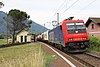 An SBB Cargo train passing Quartino station in June 2009