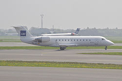 SAS (Cimber Air) Canadair CRJ200ER; EC-JOY@CPH;10.05.2013 706bw (8758502171).jpg