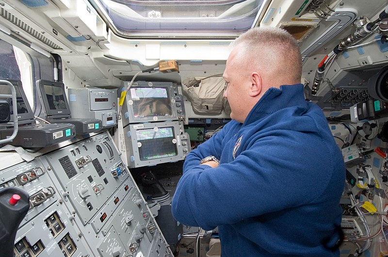 File:STS-135 Hurley on aft flight deck 1.jpg