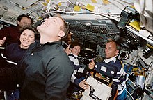 Weber (left) and her crewmates during STS-101 docking STS101-392-015 - STS-101 crew on aft flight deck during docking (Retouched).jpg