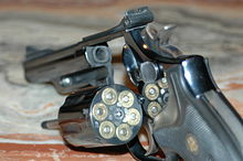 Smith & Wesson Model 19 with its cylinder open, loaded with Norma .357 Magnum ammo. Smith&Wesson Model 19.jpg