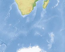 Separating the African (or Nubian-Somali plates) and Antarctic plates, the Southwest Indian Ridge (SWIR) stretches 7,700 km (4,800 mi) from the Atlantic Ocean to the Indian Ocean. With an average spreading rate of 14-15 millimetres per year (0.55-0.59 in/year), the SWIR is one of the slowest-spreading mid-ocean ridges on Earth. Characterised by numerous large transform offsets, most of the SWIR is highly segmented and oblique relative to the spreading direction. Southwest Indian Ridge Marble.jpg