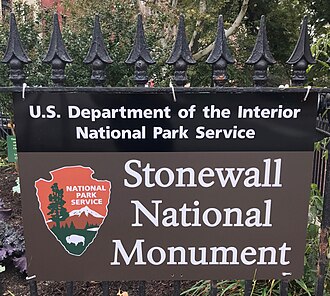 Stonewall National Monument sign at the entrance to Christopher Park Stonewall National Monument.jpg
