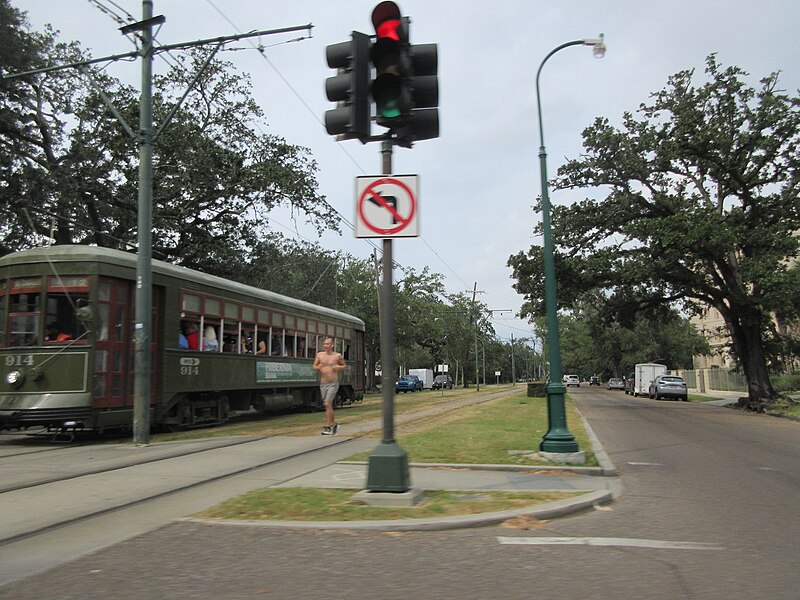 File:Streetcar and Jogger, St Charles Avenue, Uptown New Orleans, October 2022.jpg