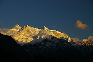 Annapurna (left) and Fang (center) in the sunset. View from Kali Gandaki Valley.