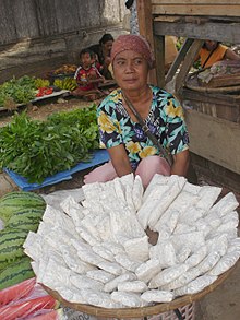 Tempeh being sold in a traditional market in Indonesia