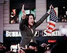 Woman in Times Square celebrating bin Laden's death. Times Square on the night Osama bin Laden killed.jpg