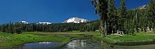 Kings Creek (foreground) headwaters flow >11 mi (18 km) from the SE slope of Lassen Peak (background), >7 mi (11 km) in Warner Creek, and >63 mi (101 km) in the North Fork to Lake Oroville's northern arm.