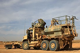 The MK28C MTVR is a variant of the MK28. Interchangeable commercial-off-the-shelf (COTS) - or modified COTS - bodies are fitted to MK28C chassis as field circumstances dictate. This example has an armored cab and is equipped with mine rollers