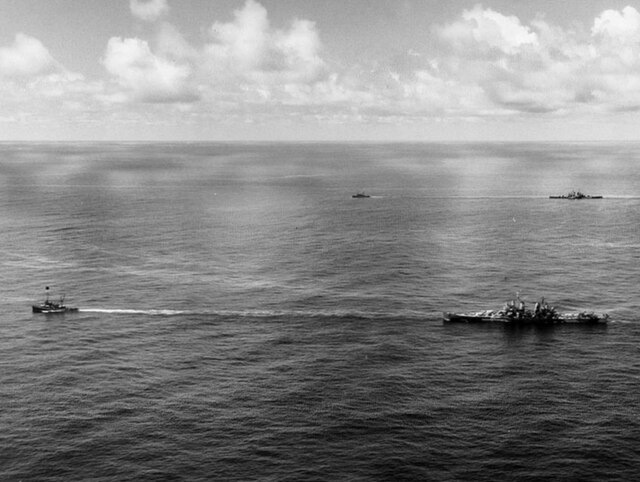 USS Canberra and USS Houston under tow after receiving torpedo hits during the Formosa Air Battle, 12–16 October 1944