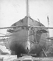 The 1874 USS Intrepid in dry dock, note the torpedo projection device at her forefoot Uss Intrepid 1874.jpg