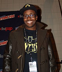 Holland at a panel on hip hop and comics at the 2014 New York Comic Con