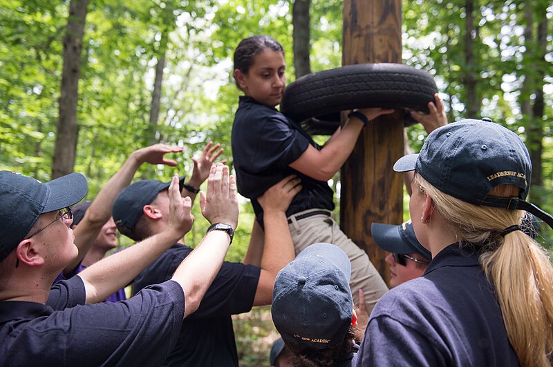 File:2015 Law Enforcement Explorers Conference explorer lowers a tire.jpg