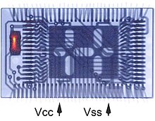 Figure 3: A magnetic current image overlay on an X-ray image of the EEPROM module. Thresholding was used to show only the strongest current at the capacitor of the TSOP08 mini-board. Arrows indicate Vcc and Vss pins. This image is in the x-y plane. 3D NASA 3.jpg