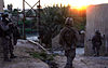 Marines from the 3rd Battalion 3rd Marine Regiment patrolling through the town of Haqlaniyah in Al Anbar Province, 2006