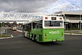 ACTION (BUS 472) - Custom Coaches 'CB60 Evo II' bodied Scania K320UB 6x2LB at the intersection of Cohen Street and Benjamin Way.jpg