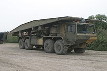 Tank bridge transporter of the United States Army. These are mobile bridges; tanks and other vehicles can use them to cross certain obstacles. AVLB 01.jpg