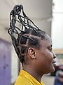 A Ghanaian woman with a hair style called 'Adonko Hair style' or 'Watchman's Wife'