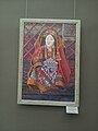 A photo of an woman wearing traditional clothes in museum