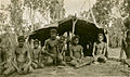 Aboriginal boys and men in front of a bush shelter - NTL PH0731-0022.jpg