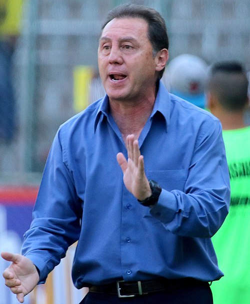 Alex Aguinaga (here as club coach in 2015) played both matches and scored both goals at Ecuador's only Gold Cup participation. Alex Aguinaga 2015 09 20.jpg