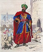 Cezayir 1817-1818 hükümdarı, yeşil bir sarıkla ışıldayan ve güzel bir kılıç giyen Ali Hoca, 1816 (C19) bombardımanından sonra mağlup olmuş düşmanların kopmuş kafalarıyla çevrilidir .jpg