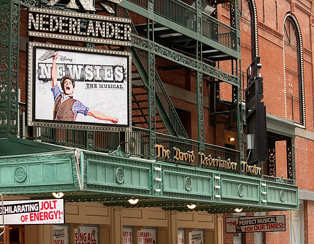 Detail of marquee and fire escape during the run of the musical Newsies