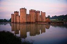 Bodiam Castle in Sussex, showing a possible analogue for the appearance of some aspects of Shirburn (such as windows and other openings) prior to the latter's 18th-century remodelling Bodiam-castle-10My8-1188.jpg