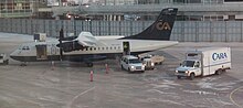 Calm Air ATR 42 at Winnipeg airport Calm Air C FECI.jpg