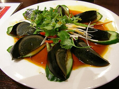 Tập_tin:Century_egg_with_cucumber_by_jetalone_in_Ginza.jpg