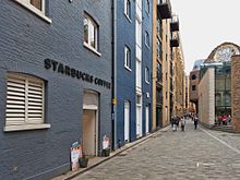 Clink Street, London. Site of Clink Prison, one of England's oldest prisons and origin of the slang "In Clink". Now home to a museum of the prison, the remains of Winchester Palace and a Starbucks. Clink Street.jpg