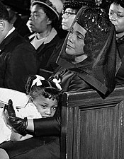 April 9, 1968: Coretta Scott King at her husband's funeral, comforting their daughter, Bernice Coretta Scott King by Moneta Sleet.jpg