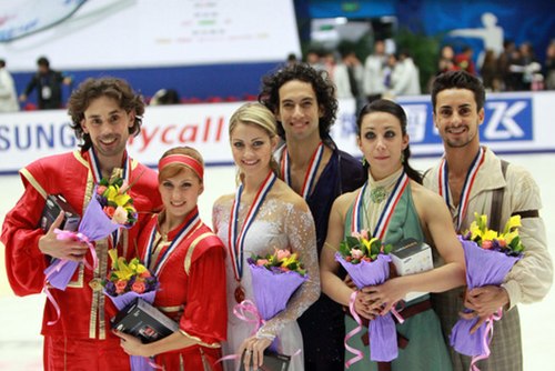 The ice dancing podium at the 2009 Cup of China. From left: Sergei Novitski / Jana Khokhlova (2nd), Tanith Belbin / Benjamin Agosto (1st), Federica Fa