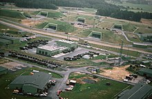 Wuschheim Air Station with six Ready Storage Shelter (RSS) for Transporter-Erector-Launcher (TEL) with BGM-109G Ground Launched Cruise Missile DF-ST-89-04254 An aerial view of the ground launched cruise missile base at Wuescheim Air Station.jpeg