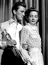 Bacall alongside Kirk Douglas in the film Young Man with a Horn (1950) Douglas - Bacall - Horn 1950.jpg