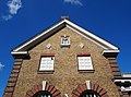 Eastern face of Beadles, an early twentieth-century car showroom now used as a pub in Dartford. [79]