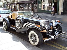 An Excalibur Roadster, considered to be the first "neoclassic" car Excalibur Series III Roadster SS in Paris.jpg