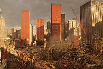 Image of the World Trade Center site, facing the Millenium Hotel (the farthest left of the orange mesh covered buildings), 17 days after the September 11, 2001 terrorist attacks FEMA - 4235 - Photograph by Andrea Booher taken on 09-28-2001 in New York.jpg