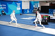 Deutsch: Fechten bei den Olympischen Jugend-Sommerspielen 2018: Tag 1, 7. Oktober 2018, Jungen, Säbel, Viertelfinale - Samuel Jarry (FRA) - Mazen Elaraby (EGY) 14:15 English: Fencing at the 2018 Summer Youth Olympics at 7 October 2018 – Boys' sabre Quarterfinals – Samuel Jarry (FRA) Vs Mazen Elaraby (EGY) 14:15