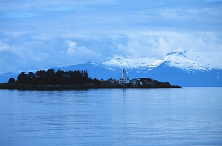 View across Frederick Sound, to the Five Finger Islands Light. Five Fingers Light, Alaska, 1992.jpg