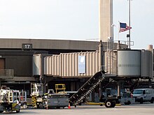 An American flag now flies over Gate 17 of Terminal A at Newark Liberty International Airport, departure gate of United 93. Flight 93 gate flag.jpg