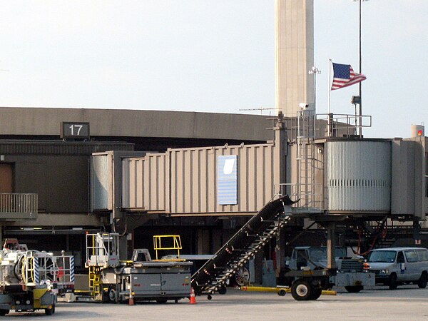 An American flag flies over the airport's departure gate A17 (old Terminal A), where al-Qaeda terrorists boarded United Airlines Flight 93 during the 