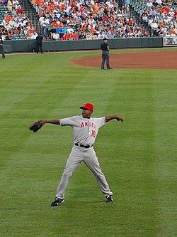 Anaheim, CA. 4th Apr, 2016. Former Los Angeles Angels player Garrett  Anderson #16 throws out the first pitch before the Opening Night Major  League Baseball game between the Chicago Cubs and the