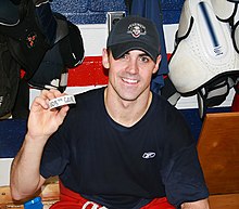 Mark Hartigan with his 105th career goal puck with the Syracuse Crunch. Hartigan's 105th goal as a member of the Syracuse Crunch set a franchise record, passing Lonny Bohonos. Hartigan105.jpg