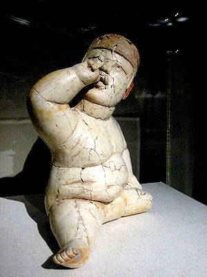 Statuina Olmeca: Statuine volto di bambino, Uomo allungato, Motivo delluomo-giaguaro