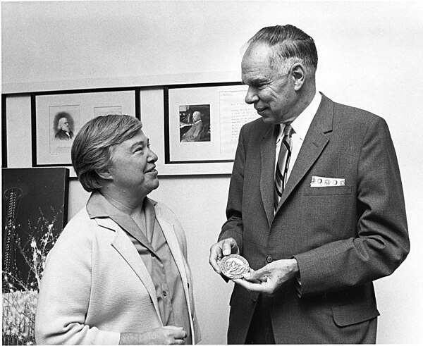 Dixy Lee Ray presents the Pacific Science Center's "Arches of Science" award to Nobel Laureate Glenn Seaborg in 1968. At the time Seaborg was Chair of