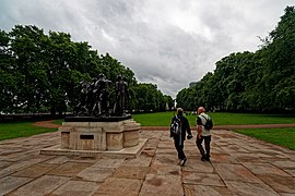 London - Victoria Tower Gardens 1881 - View South on Replica (1911) of The Burghers of Calais 1889 by Auguste Rodin - Situated here in 1915 - Gothic Revival Buxton Memorial Fountain 1865 by Samuel Sanders Teulon.jpg