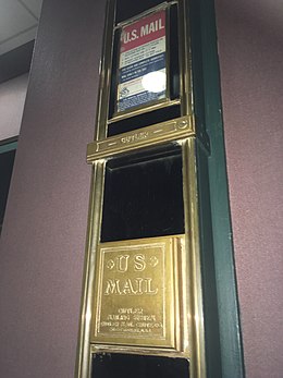 A mail chute in a law building in Akron, Ohio