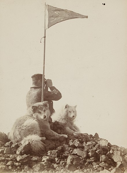 Expedition member with binoculars, Antarctica, 1899